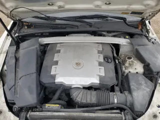 2009 Cadillac CTS AWD z VIN 1G6DT57V390101668, wystawiony jako Copart lot #83592544 z przebiegiem 107 368 mil mil oraz Szkoda całkowita • Salvage title. Historia ofert i sprzedaży dostępna na DreamBid. Obrazek 13.