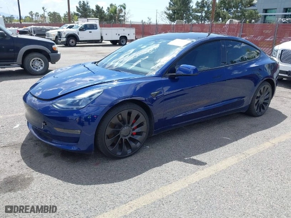 2022 Tesla Model 3 Performance with VIN 5YJ3E1EC1NF296758, listed as a IAAI auction lot 41960443 with 30,754 mi miles. Bid and sale history available at carsss.com. Image 2.