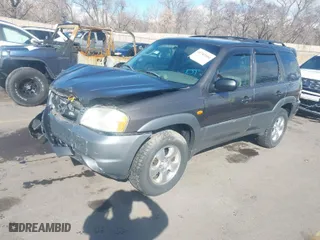 2002 Mazda Tribute LX with VIN 4F2YU08142KM18539, listed as a IAAI auction lot 41742104 with 230,254 mi miles. Bid and sale history available at carsss.com. Image 2.
