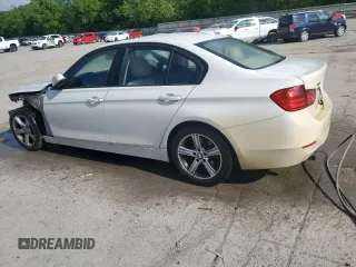 2013 BMW 3 Series 320i xDrive with VIN WBA3C3C57DF980971, listed as a Copart auction lot 57441155 with 131,263 mi miles and Salvage title. Bid and sale history available at DreamBid. Image 2.