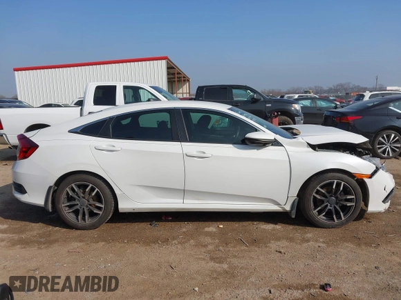 2020 Honda Civic LX z VIN 2HGFC2F68LH565560, wystawiony jako IAAI lot #41517853 z przebiegiem 96 832 mil mil oraz . Historia ofert i sprzedaży dostępna na DreamBid. Obrazek 13.