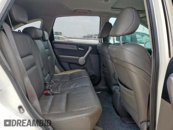 2007 Honda CR-V EX-L z VIN JHLRE38747C005094, wystawiony jako Copart lot #57590145 z przebiegiem 186 808 mil mil oraz Czysty tytuł • Clean title. Historia ofert i sprzedaży dostępna na DreamBid. Obrazek 11.