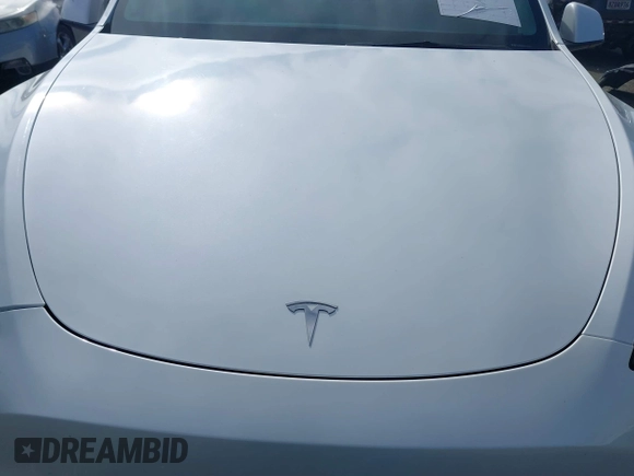 2023 Tesla Model Y Long Range with VIN 7SAYGDEE9PA094191, listed as a IAAI auction lot 41906319 with 15,240 mi miles and . Bid and sale history available at DreamBid. Image 10.