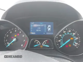 2014 Ford Escape SE z VIN 1FMCU9GX9EUC35713, wystawiony jako IAAI lot #42323161 z przebiegiem 169 393 mil mil oraz . Historia ofert i sprzedaży dostępna na DreamBid. Obrazek 7.