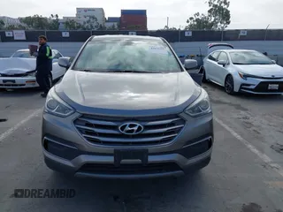 2018 Hyundai Santa Fe 2.4L with VIN 5NMZT3LB4JH069868, listed as a IAAI auction lot 42675555 with 142,612 mi miles and . Bid and sale history available at DreamBid. Image 12.