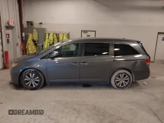 2014 Honda Odyssey EX-L with VIN 5FNRL5H67EB056983, listed as a IAAI auction lot 42318699 with 256,267 mi miles and . Bid and sale history available at DreamBid. Image 14.