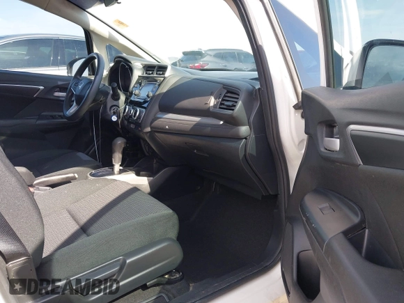 2019 Honda Fit LX with VIN 3HGGK5H49KM733792, listed as a IAAI auction lot 42597164 with 88,161 mi miles and . Bid and sale history available at DreamBid. Image 5.