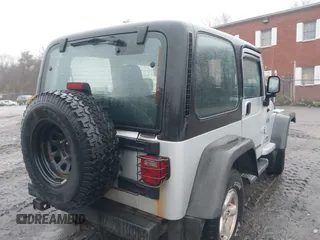 2006 Jeep Wrangler X with VIN 1J4FA39SX6P709588, listed as a IAAI auction lot 41927435 with 227,990 mi miles. Bid and sale history available at carsss.com. Image 4.