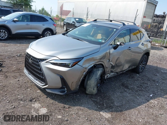 2024 Lexus NX 350h Premium z VIN 2T2GKCEZ6RC019104, wystawiony jako IAAI lot #42475819 z przebiegiem 15 870 mil mil oraz . Historia ofert i sprzedaży dostępna na DreamBid. Obrazek 18.