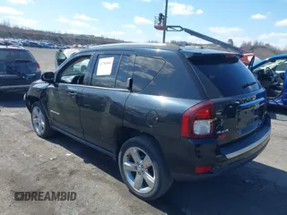 2014 Jeep Compass Limited with VIN 1C4NJDCBXED706173, listed as a IAAI auction lot 41784040 with 144,368 mi miles. Bid and sale history available at carsss.com. Image 3.