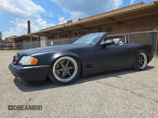 1999 Mercedes-Benz SL 500 with VIN WDBFA68FXXF184548, listed as a Copart auction lot 63814775 with 133,681 mi miles and Clean title. Bid and sale history available at DreamBid. Image 2.