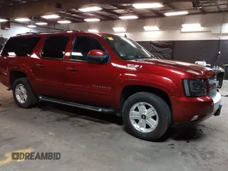 2010 Chevrolet Suburban LT z VIN 1GNUKJE32AR106197, wystawiony jako IAAI lot #42378134 z przebiegiem 106 479 mil mil oraz . Historia ofert i sprzedaży dostępna na DreamBid. Obrazek 1.