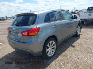 2015 Mitsubishi Outlander ES z VIN 4A4AP3AUXFE026547, wystawiony jako IAAI lot #42223662 z przebiegiem 155 990 mil mil oraz . Historia ofert i sprzedaży dostępna na DreamBid. Obrazek 4.