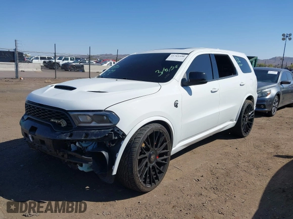 2021 Dodge Durango SRT Hellcat with VIN 1C4SDJH96MC692601, listed as a IAAI auction lot 41764490 with 27,434 mi miles and . Bid and sale history available at DreamBid. Image 19.