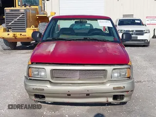 1996 GMC Sonoma SLS with VIN 1GTCS14X4T8515402, listed as a IAAI auction lot 42137071 with 165,316 mi miles. Bid and sale history available at carsss.com. Image 6.