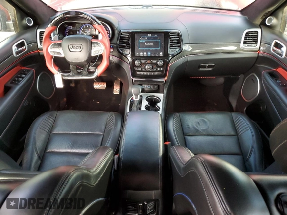 2020 Jeep Grand Cherokee Trackhawk with VIN 1C4RJFN95LC334610, listed as a Copart auction lot 49160944 with 23,348 mi miles and Salvage title. Bid and sale history available at DreamBid. Image 8.