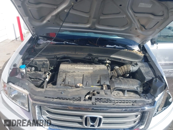 2014 Honda Ridgeline RTL z VIN 5FPYK1F51EB012843, wystawiony jako IAAI lot #41629002 z przebiegiem 114 761 mil mil oraz . Historia ofert i sprzedaży dostępna na DreamBid. Obrazek 10.
