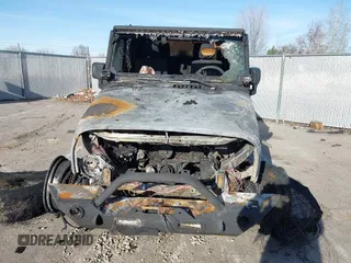 2011 Jeep Wrangler Sahara with VIN 1J4AA5D14BL514060, listed as a IAAI auction lot 41142809 with Not Provided miles and . Bid and sale history available at DreamBid. Image 6.
