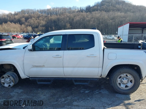 2023 Toyota Tacoma 4WD SR with VIN 3TMCZ5AN1PM538367, listed as a IAAI auction lot 41468684 with 28,879 mi miles. Bid and sale history available at carsss.com. Image 14.