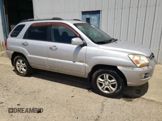 2005 Kia Sportage LX with VIN KNDJE723657067187, listed as a Copart auction lot 57403525 with 228,648 mi miles and Clean title. Bid and sale history available at DreamBid. Image 4.