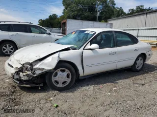 1997 Ford Taurus GL with VIN 1FALP52U1VA284087, listed as a Copart auction lot 71014334 with 175,323 mi miles and Salvage Title. Bid and sale history available at carsss.com. Image 1.