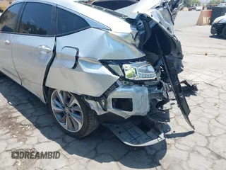 2018 Honda Clarity Touring z VIN JHMZC5F31JC021516, wystawiony jako IAAI lot #42478787 z przebiegiem 87 519 mil mil oraz . Historia ofert i sprzedaży dostępna na DreamBid. Obrazek 18.