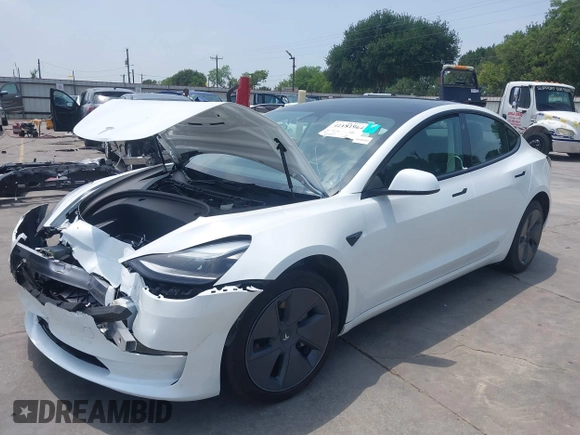 2023 Tesla Model 3 z VIN 5YJ3E1EA3PF604076, wystawiony jako IAAI lot #42181964 z przebiegiem 23 207 mil mil oraz . Historia ofert i sprzedaży dostępna na DreamBid. Obrazek 2.