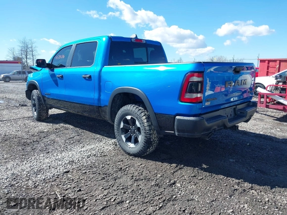 2022 Ram 1500 Rebel z VIN 1C6SRFLT0NN177124, wystawiony jako IAAI lot #41575076 z przebiegiem 40 065 mil mil oraz . Historia ofert i sprzedaży dostępna na DreamBid. Obrazek 3.
