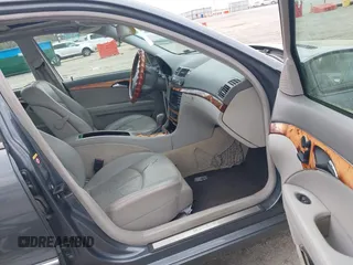2006 Mercedes-Benz E-Class 3.5L with VIN WDBUF56J16A806413, listed as a IAAI auction lot 41936455 with 133,678 mi miles. Bid and sale history available at carsss.com. Image 5.