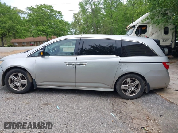 2012 Honda Odyssey Touring with VIN 5FNRL5H95CB101605, listed as a IAAI auction lot 42025163 with 286,421 mi miles. Bid and sale history available at carsss.com. Image 15.