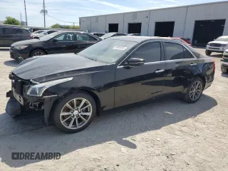 2019 Cadillac CTS Luxury RWD z VIN 1G6AR5SSXK0104314, wystawiony jako Copart lot #49865045 z przebiegiem 113 456 mil mil oraz Nie do naprawy • Non repairable. Historia ofert i sprzedaży dostępna na DreamBid. Obrazek 1.