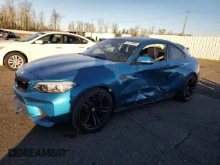 2018 BMW M2 with VIN WBS1J5C55JVD35955, listed as a Copart auction lot 87475984 with 75,094 mi miles and Salvage Title. Bid and sale history available at carsss.com. Image 1.
