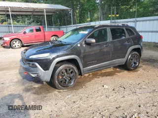 2015 Jeep Cherokee Trailhawk z VIN 1C4PJMBS6FW652001, wystawiony jako Copart lot #62344785 z przebiegiem 165 473 mil mil oraz Szkoda całkowita • Salvage title. Historia ofert i sprzedaży dostępna na DreamBid. Obrazek 1.