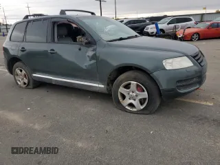 2004 Volkswagen Touareg with VIN WVGCM67L04D027410, listed as a Copart auction lot 79044964 with 100,509 mi miles and Salvage title. Bid and sale history available at DreamBid. Image 4.