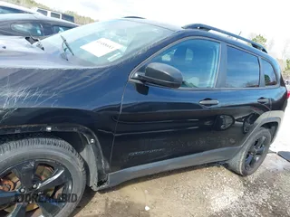 2017 Jeep Cherokee Altitude with VIN 1C4PJLAB7HW660624, listed as a IAAI auction lot 41488683 with 106,963 mi miles and . Bid and sale history available at DreamBid. Image 14.