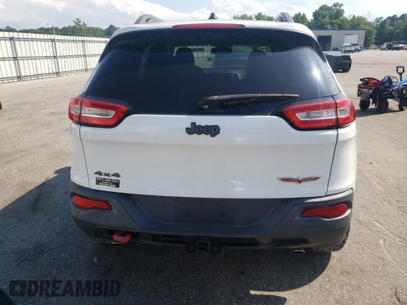 2014 Jeep Cherokee Trailhawk with VIN 1C4PJMBS5EW185510, listed as a Copart auction lot 55780005 with 130,358 mi miles and Clean title. Bid and sale history available at DreamBid. Image 6.
