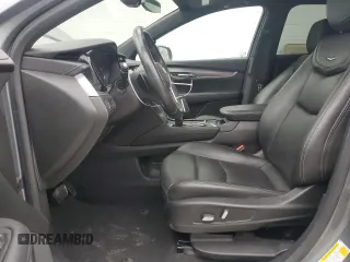 2021 Cadillac XT5 AWD Luxury z VIN 1GYKNBR49MZ147215, wystawiony jako Copart lot #50804575 z przebiegiem 82 153 mil mil oraz Czysty tytuł • Clean title. Historia ofert i sprzedaży dostępna na DreamBid. Obrazek 7.