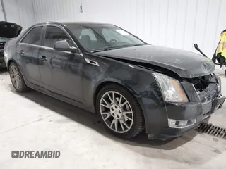 2013 Cadillac CTS Premium z VIN 1G6DS5E34D0103328, wystawiony jako IAAI lot #41501406 z przebiegiem 157 633 mil mil oraz . Historia ofert i sprzedaży dostępna na DreamBid. Obrazek 1.