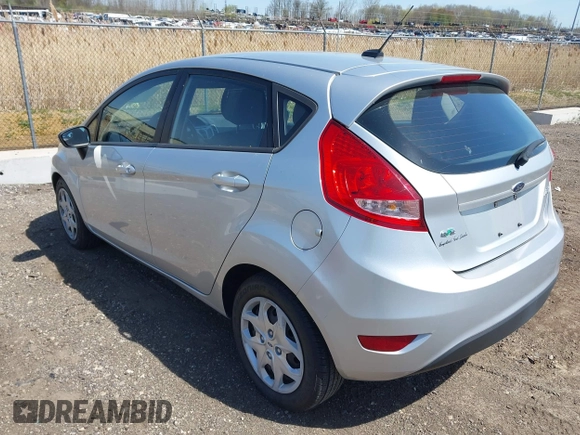 2013 Ford Fiesta SE with VIN 3FADP4EJ9DM157685, listed as a IAAI auction lot 42145511 with 101,331 mi miles. Bid and sale history available at carsss.com. Image 3.