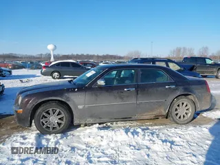 2005 Chrysler 300 with VIN 2C3AA63H65H526016, listed as a IAAI auction lot 41296420 with 136,794 mi miles. Bid and sale history available at carsss.com. Image 14.