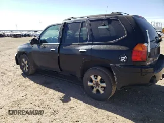 2002 GMC Envoy SLT with VIN 1GKDT13S022107749, listed as a Copart auction lot 59548544 with 221,224 mi miles and Clean Title. Bid and sale history available at DreamBid. Image 2.