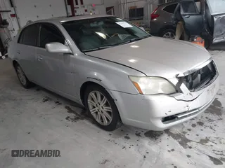 2007 Toyota Avalon XL z VIN 4T1BK36B87U210065, wystawiony jako IAAI lot #42301713 z przebiegiem 263 231 mil mil oraz . Historia ofert i sprzedaży dostępna na DreamBid. Obrazek 1.