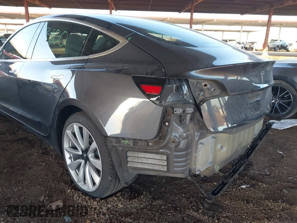 2018 Tesla Model 3 Long Range Battery with VIN 5YJ3E1EA3JF169132, listed as a IAAI auction lot 41678383 with 170,809 mi miles and . Bid and sale history available at DreamBid. Image 6.