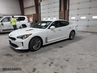 2018 Kia Stinger with VIN KNAE15LA6J6031821, listed as a IAAI auction lot 41871185 with 164,393 mi miles. Bid and sale history available at carsss.com. Image 2.