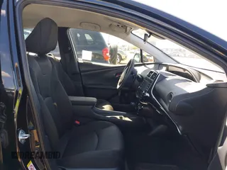 2021 Toyota Prius L Eco with VIN JTDKAMFU6M3135799, listed as a IAAI auction lot 42064241 with 77,120 mi miles and . Bid and sale history available at DreamBid. Image 5.