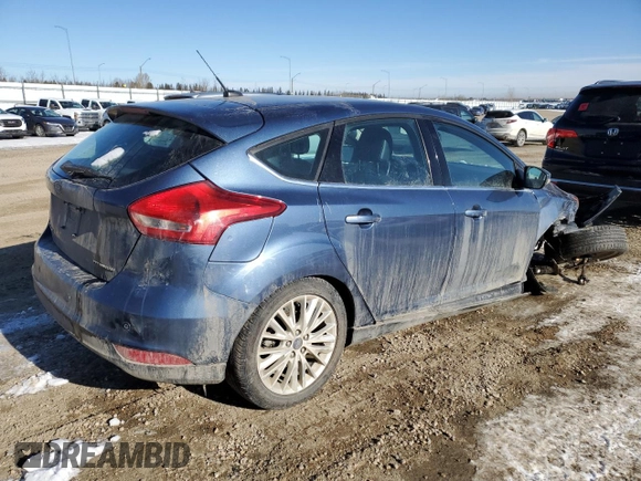 2018 Ford Focus Titanium z VIN 1FADP3N2XJL297048, wystawiony jako Copart lot #61579925 z przebiegiem 68 774 mil mil oraz Szkoda całkowita • Salvage title. Historia ofert i sprzedaży dostępna na DreamBid. Obrazek 3.
