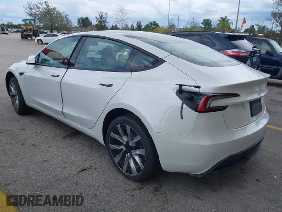 2024 Tesla Model 3 with VIN 5YJ3E1EA6RF751009, listed as a IAAI auction lot 40537919 with Not Provided miles and . Bid and sale history available at DreamBid. Image 3.