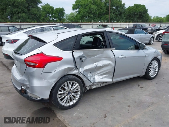 2015 Ford Focus Titanium with VIN 1FADP3N23FL356822, listed as a IAAI auction lot 41981053 with 115,584 mi miles and . Bid and sale history available at DreamBid. Image 6.