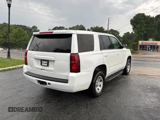 2019 Chevrolet Tahoe Commercial with VIN 1GNLCDECXKR281986, listed as a Copart auction lot 63148895 with 103,693 mi miles and Clean title. Bid and sale history available at DreamBid. Image 4.