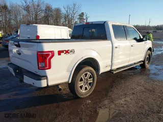 2015 Ford F-150 XLT w/HD Payload Pkg with VIN 1FTFW1EF6FFC66723, listed as a IAAI auction lot 41303476 with 203,999 mi miles. Bid and sale history available at carsss.com. Image 4.